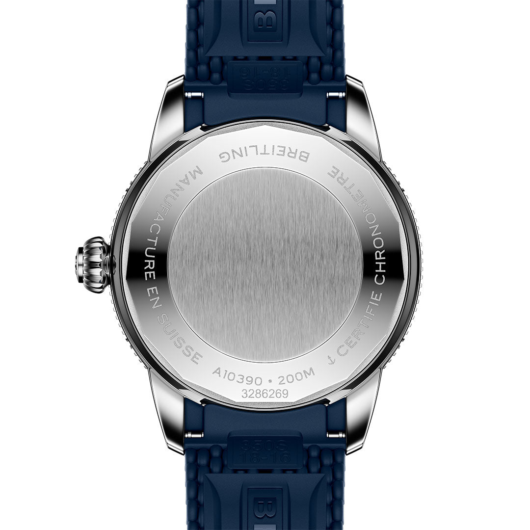 The Breitling Superocean Heritage B31 Automatic 36 dive watch’s back view shows a stainless steel case back with the brand and technical engravings, like 200M water resistance and Swiss made, paired with a blue rubber strap.
