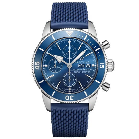 The BREITLING Superocean Heritage Chronograph 44 is an esteemed diver's watch that boasts a blue dial with three subdials, a day-date display, and large, luminous hands and markers encased in a durable stainless steel case. Its coordinating textured rubber strap enhances the classic design.