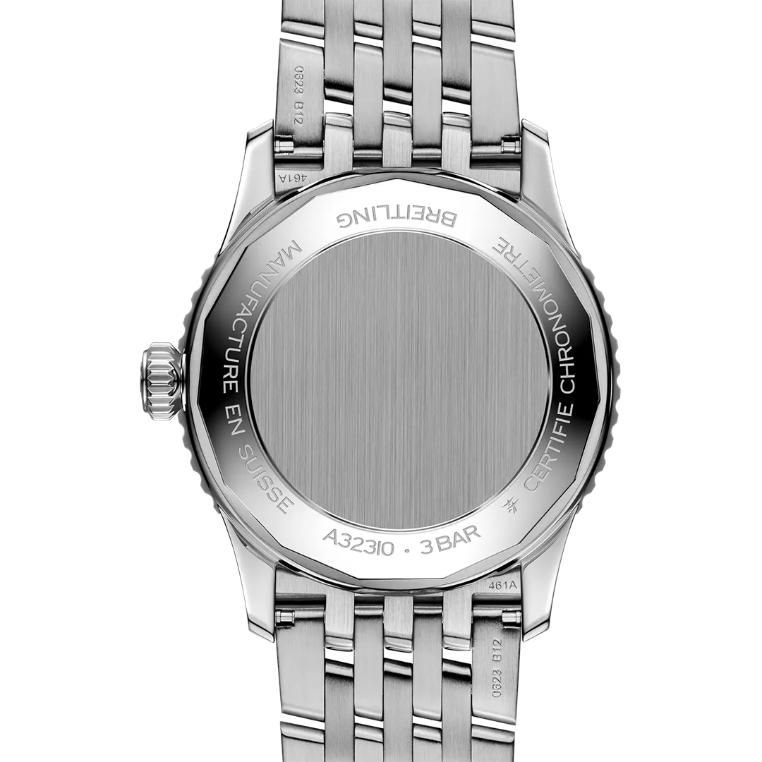 The back of a silver-tone BREITLING Navitimer Automatic GMT 41 wristwatch featuring a circular brushed center surrounded by engraved text, including “MANUFACTURE EN SUISSE,” “CERTIFIE CHRONOMETRE,” and water resistance details.