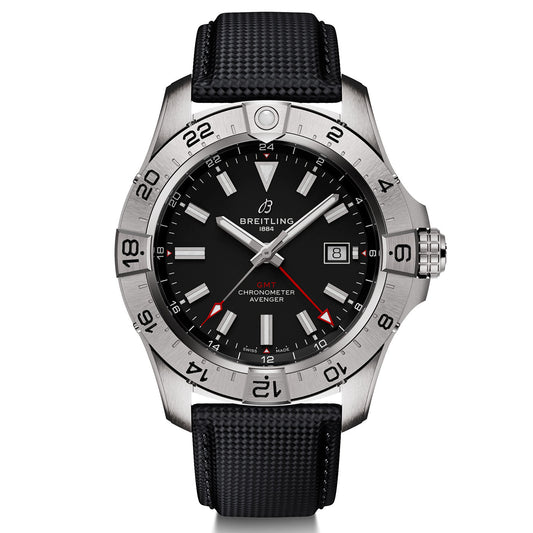 Introducing the BREITLING Avenger Automatic GMT 44 by Breitling—a wristwatch with a stainless steel case and remarkable durability. It features a black dial accented by white hour markers and striking red details. This timepiece includes a GMT function, a date window positioned at 3 o'clock, and is complemented by a black textured strap. The bezel is designed in 24-hour increments, ensuring optimal performance for any adventure.