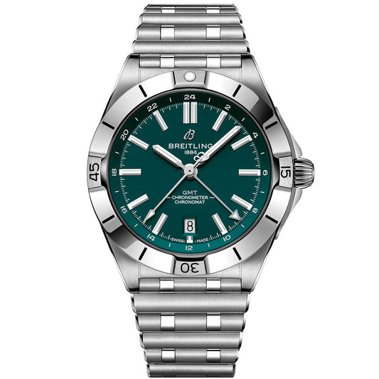 The BREITLING Chronomat Automatic GMT 40 features a stainless steel case, green dial with silver hour markers and hands, date display at 6 o'clock, black-marked bezel, metal link bracelet, and "BREITLING 1884" on the face.