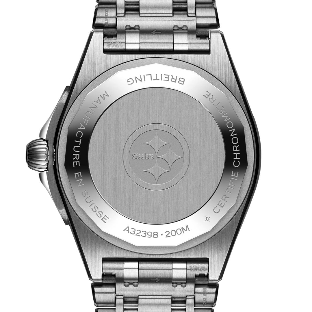The BREITLING Chronomat Automatic GMT 40’s caseback displays the Pittsburgh Steelers logo, with engravings for water resistance, Swiss manufacture, model number, and its Chronomat GMT 40 designation.