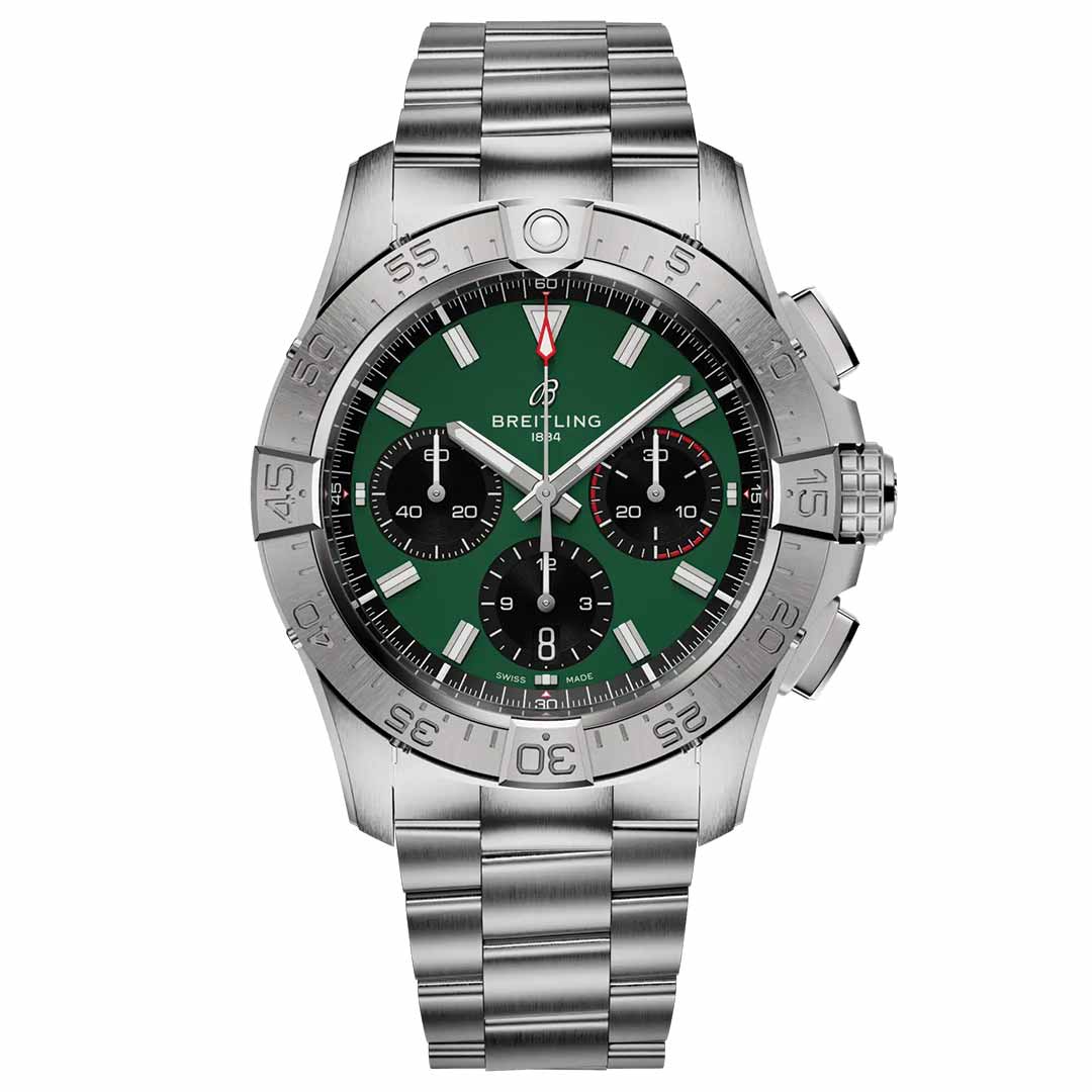 The BREITLING Avenger B01 Chronograph 42 features a green dial with three black sub-dials, a date window at 6 o'clock, and an aviation-style rotating bezel marked with numbers. The watch is complemented by a silver stainless steel bracelet.