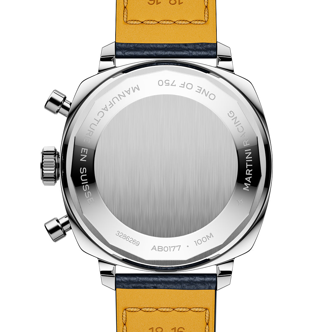The image displays the BREITLING Top Time B01 Martini Racing watch, boasting a stainless steel case and tan leather strap. It features two side buttons and is engraved with "ONE OF 750," "MARTINI RACING," and "MANUFACTURE EN SUISSE.