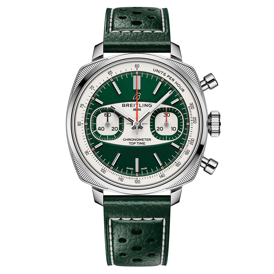 The BREITLING Top Time B01 Racing by Breitling features a modern-retro design with a green dial, leather strap, silver hour markers, dual subdials, red-accented chronograph, and an elegantly branded "units per hour" bezel. It is completed with prominent side pushers and a crown.