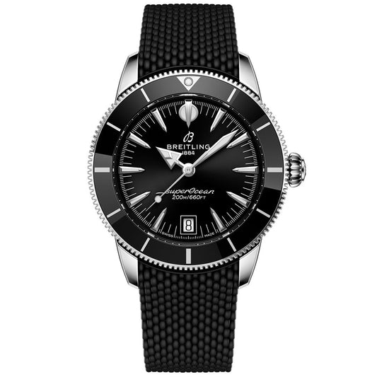 The BREITLING Superocean Heritage B31 Automatic 40 is a black dive watch with a textured black strap, black dial, silver hands and markers, date at 6 o'clock, and "Breitling 1884" plus "Superocean 200m/660ft" on the face.