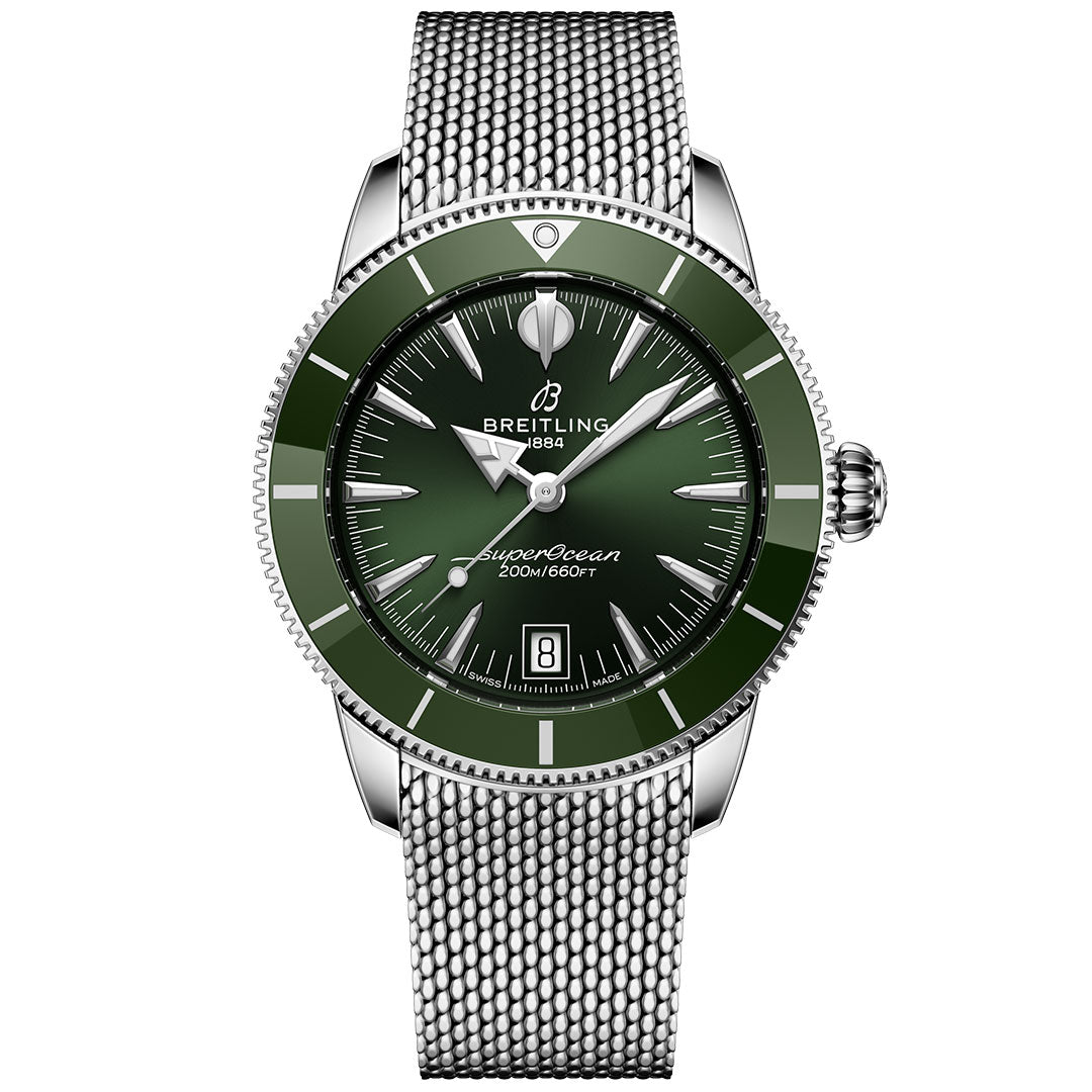 The Breitling Superocean Heritage B31 Automatic 40 features a green bezel and dial, silver hour markers, a mesh stainless steel strap, date display at 6 o’clock, and is water-resistant to 200 meters.