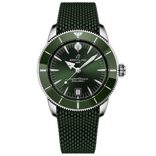 The Breitling Superocean Heritage B31 Automatic 42 is a green dive watch with a round stainless steel case, green dial, white markers and hands, date at 6 o’clock, textured green strap, and water resistance to 200 meters (660 ft).