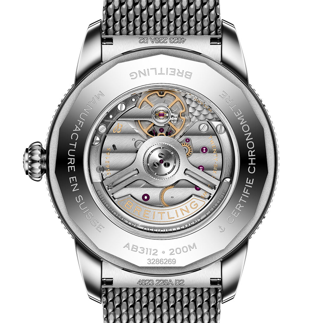 Close-up of the back of the Breitling Superocean Heritage B31 Automatic 44, revealing its intricate mechanical movement through a transparent case back, with engraved details highlighting the brand and model.