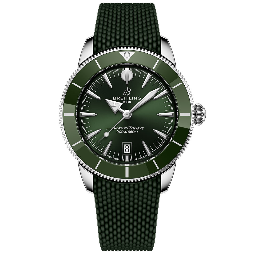 The Breitling Superocean Heritage B31 Automatic 44 features a green bezel and dial, silver hands and hour markers, a date at 6 o’clock, textured green strap, and is water resistant to 200m.