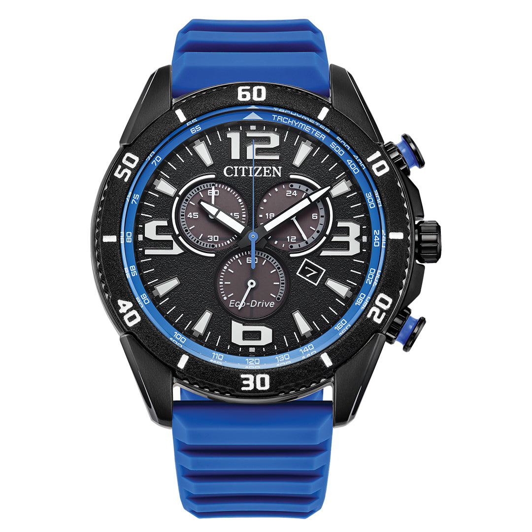 The CITIZEN Brycen Eco-Drive 44.8mm Watch features a black dial with silver indices and blue accents, a blue tachymeter bezel, three subdials, date display at 4 o'clock, and a durable blue rubber strap. It's water-resistant for added assurance.