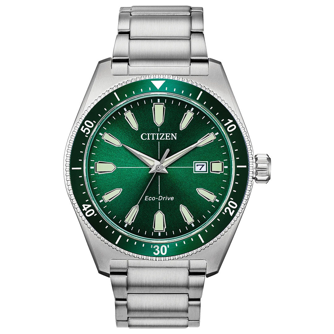The CITIZEN Brycen Eco-Drive 43mm Watch features a green dial, silver hour markers and hands, date display at 3 o’clock, stainless steel link band, and Eco-Drive logo above 6 o’clock.