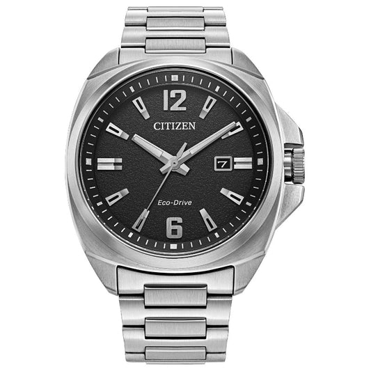 The CITIZEN Endicott Eco-Drive 42mm Watch features Eco-Drive technology and boasts a sophisticated silver design with a black dial highlighted by silver hour markers and hands. It also includes a date display at the three o'clock position and is paired with a stainless steel bracelet band.