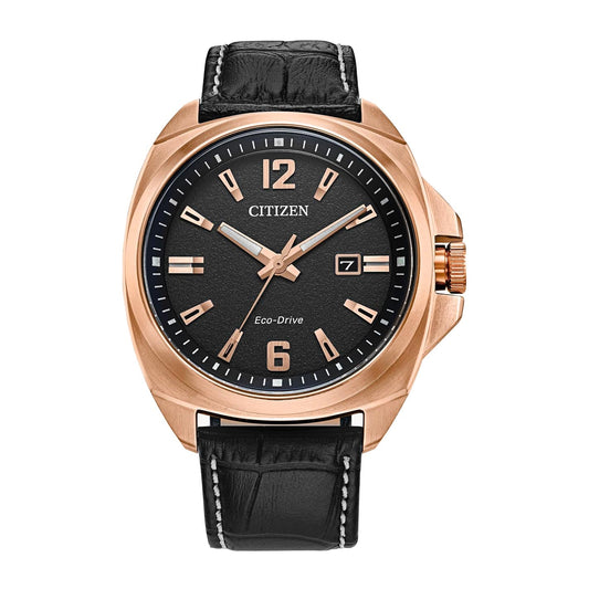 The CITIZEN Endicott Eco-Drive 42mm Watch showcases a stylish black leather strap and a beautiful rose gold-tone case. Its black dial is highlighted by silver-toned hour markers and hands, with Arabic numerals marking the 12 and 6 positions, along with a date display gracefully located at 3 o'clock.