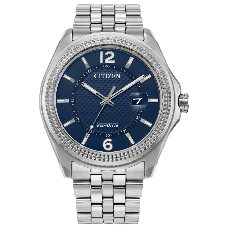 The CITIZEN Corso Eco-Drive 42mm Watch exudes timeless sophistication with its elegantly displayed silver metal construction and blue textured dial. It features a stainless steel bracelet, silver hour markers and hands, a date window at the 3 o'clock position, and a robust stainless-steel case.