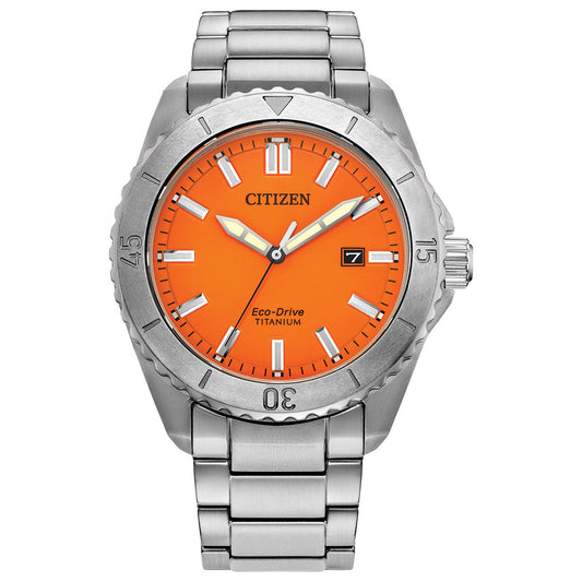 The CITIZEN Brycen Super Titanium Eco-Drive 41mm watch features a vibrant orange dial adorned with silver hour markers and includes a date window positioned at 3 o'clock. Its sporty design is highlighted by the Super Titanium link bracelet and a textured bezel complete with minute markings.