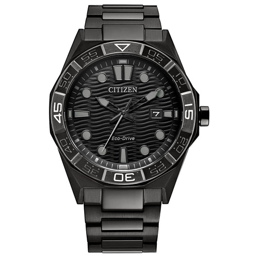 The CITIZEN Brycen Eco-Drive 42mm Watch is a black ion-plated stainless steel sport casual timepiece featuring a textured wavy dial, bold hour markers, a date display at 3 o’clock, and a prominent bezel with minute markings.