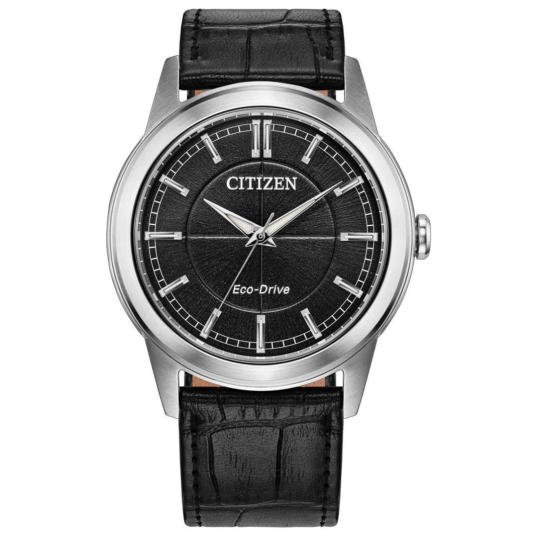 The CITIZEN Rolan Eco-Drive 41mm Watch features a black textured dial with silver hour markers and hands, a sleek stainless steel case, and a stylish black leather strap. The timepiece displays 10:08 on its distinctive black dial.