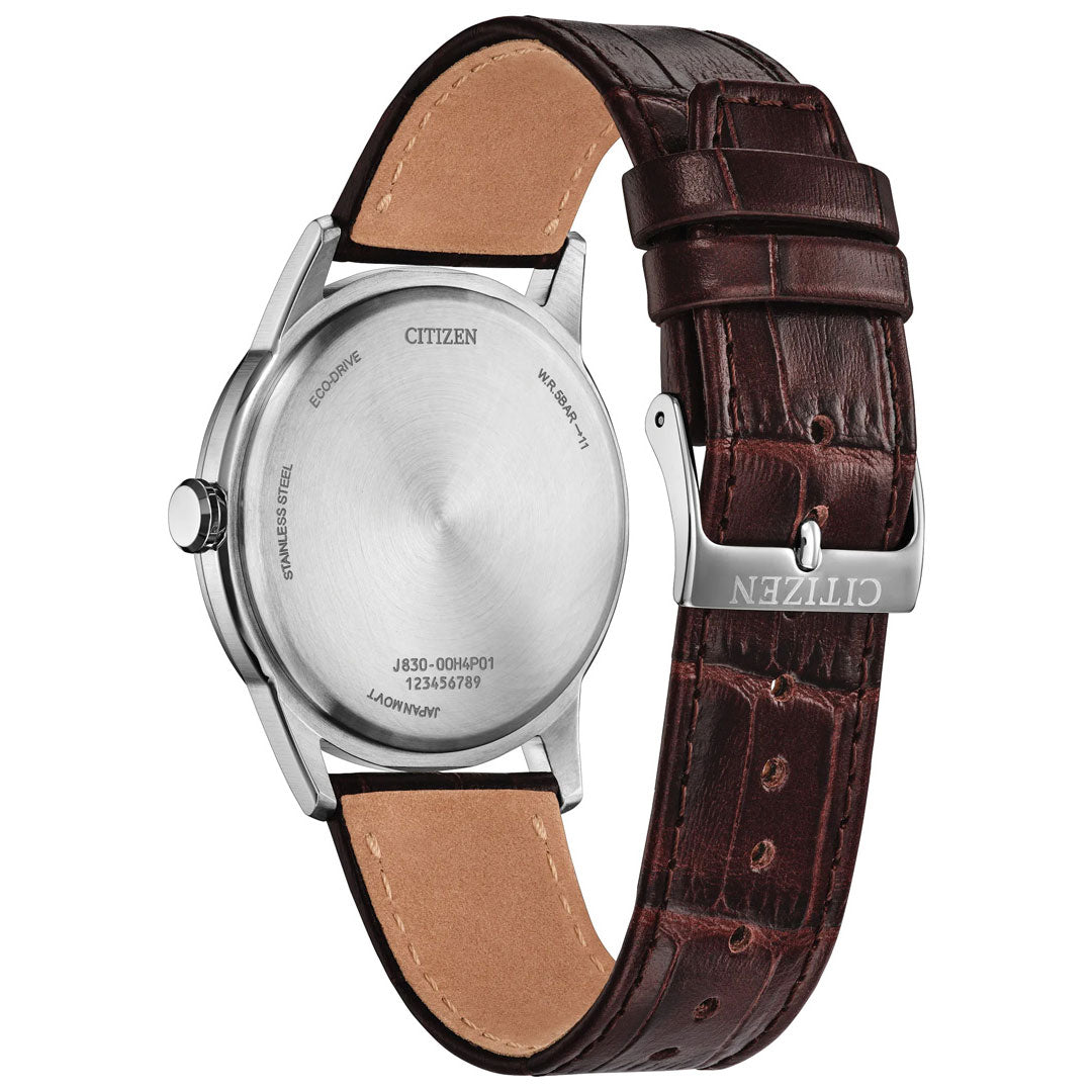 Back view of the CITIZEN Rolan Eco-Drive 41mm Watch, featuring a brown leather strap and a stainless steel case with engraved details—including model and serial numbers—visible on the back cover. This sophisticated timepiece is powered by CITIZEN’s renowned Eco-Drive technology.