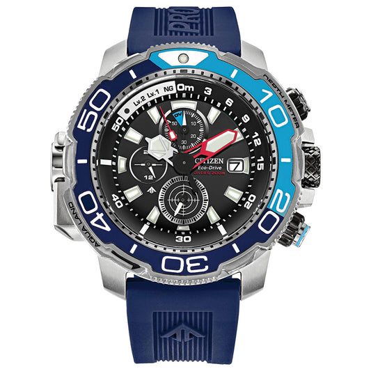 This close-up highlights a CITIZEN Promaster Aqualand Eco-Drive 46mm Watch, showcasing its blue and silver bezel with dive-time markings, a black dial with sub-dials accented in red and white, and complemented by a blue rubber strap.