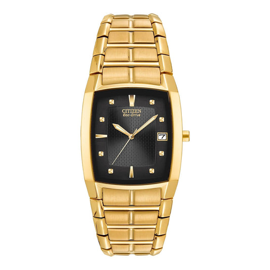 The CITIZEN Chandler Eco-Drive 33mm Watch features a rectangular black dial adorned with gold hour markers and hands, a date window at the 3 o'clock position, all elegantly paired with a matching gold-tone stainless steel bracelet.