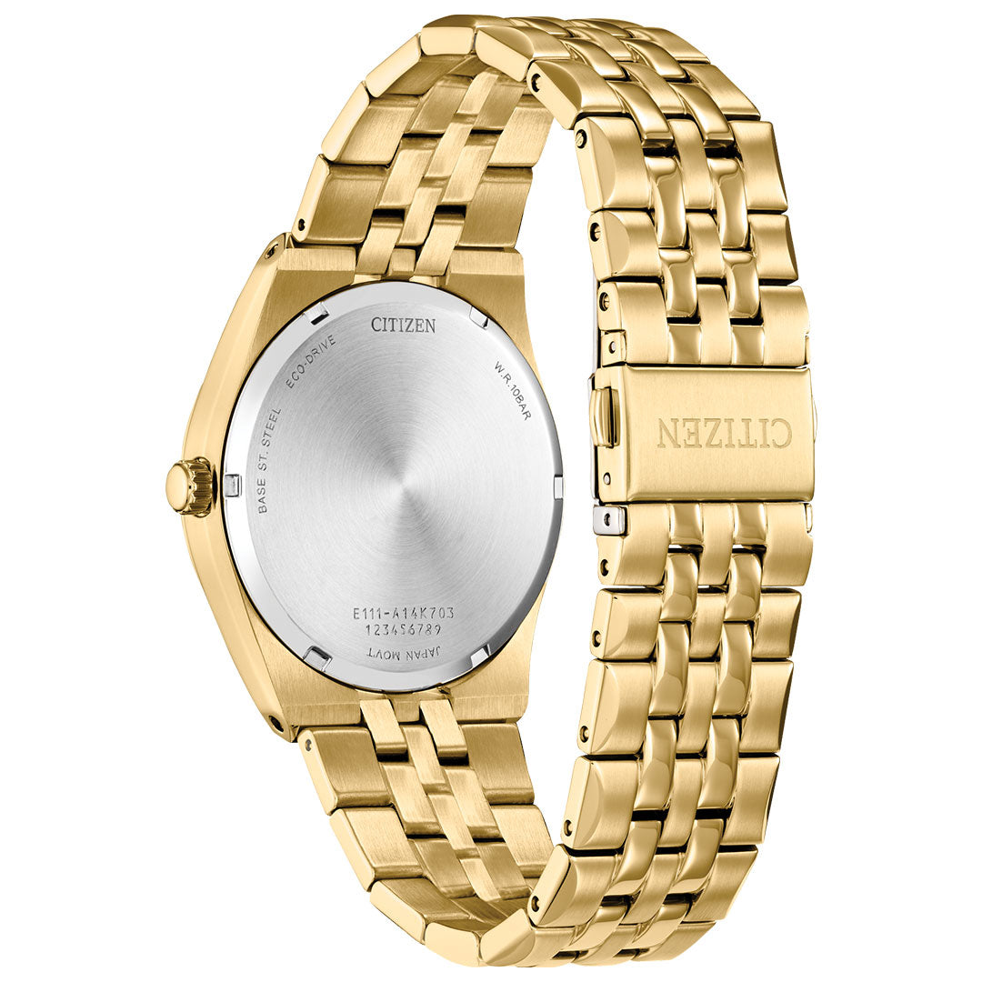 The CITIZEN Corso Eco-Drive 40mm Watch, made from gold-tone stainless steel, features a metallic link bracelet displayed from the back. Its round face is complemented by a silver backplate with etched text, while the clasp is engraved with "CITIZEN." This sophisticated Eco-Drive timepiece merges timeless elegance with innovative technology for environmentally conscious wear.