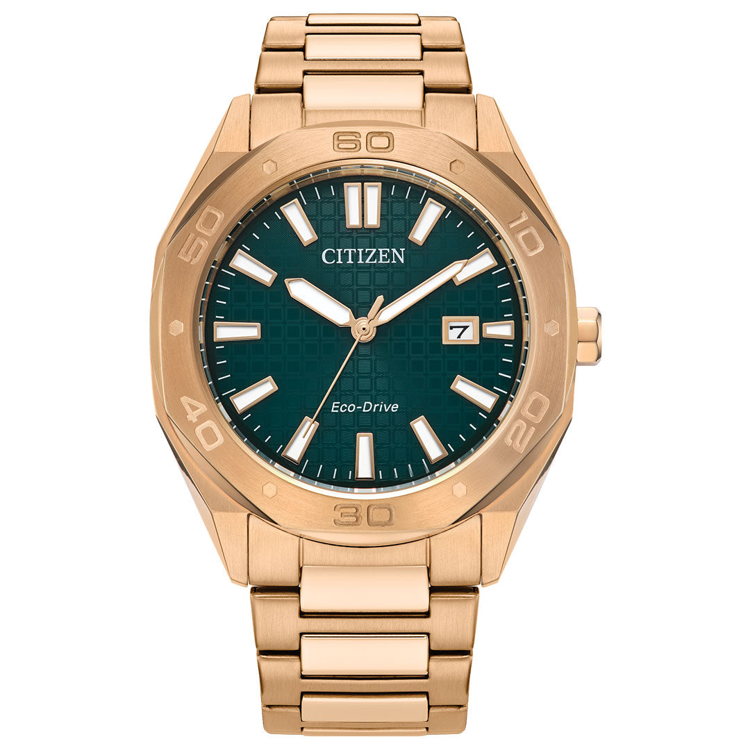 The CITIZEN Weekender Eco-Drive 41mm Watch, by CITIZEN, showcases a gold-toned stainless steel case with a green dial accented by white hour markers and hands. This timepiece is powered by Eco-Drive technology and features a date display at the 3 o'clock position, complemented by a durable metal link band.