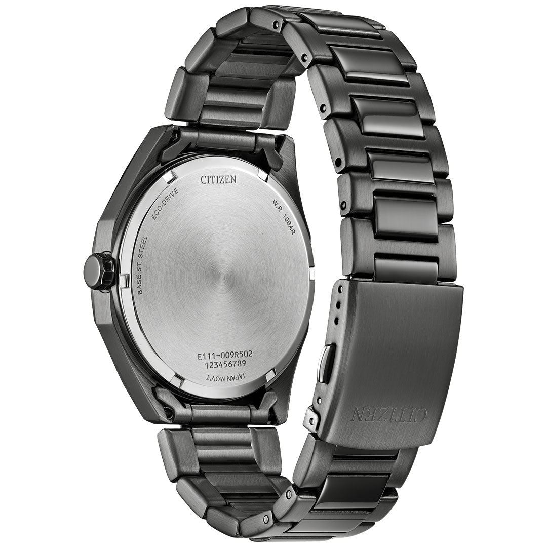 The rear view of the CITIZEN Weekender Eco-Drive 41mm Watch highlights a matte silver bracelet and clasp. Its stainless steel case boasts engraved details, including model numbers and descriptions. The elegant metallic links of the bracelet enhance its modern aesthetic, while showcasing Eco-Drive technology for uninterrupted power.