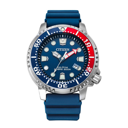 The CITIZEN Promaster Dive Eco-Drive 44mm Watch features a water-resistant blue and red bezel, a blue dial with luminous hour markers and hands, and a stylish blue rubber strap. The dial prominently displays "Eco-Drive" and "Diver's 200m.