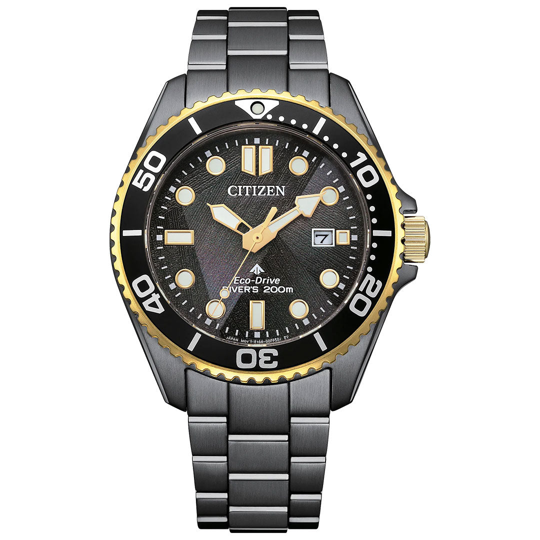 The CITIZEN Promaster Dive Light in Black Eco-Drive 40.6mm Watch features a black and gold bezel, silver strap, black textured dial, luminous markers and hands, date display at 3 o'clock, and is water resistant up to 200 meters.