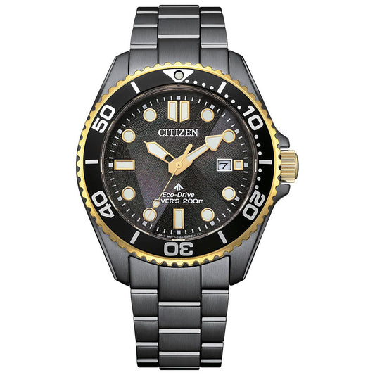 The CITIZEN Promaster Dive Light in Black Eco-Drive 40.6mm Watch features a black and gold bezel, silver strap, black textured dial, luminous markers and hands, date display at 3 o'clock, and is water resistant up to 200 meters.