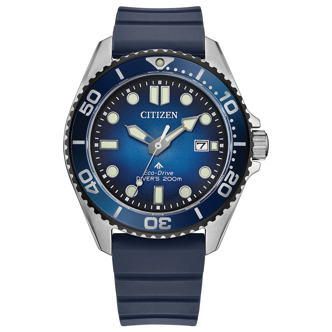 The CITIZEN Promaster Dive Eco-Drive 40.6mm Watch features a blue dial with silver accents, a date display, and a blue rubber strap; it is ISO-certified for diving and water resistant up to 200 meters.