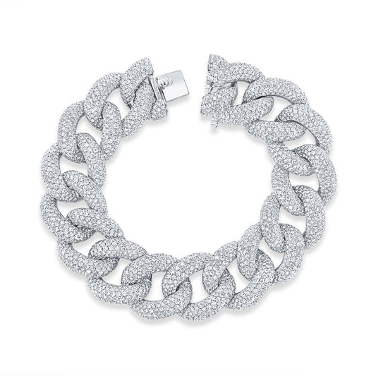 The Uneek Legacy 18K White Gold Diamond Bracelet is a luxurious piece from the esteemed brand Uneek, featuring an exquisite interlocking link design adorned with dazzling round diamonds. Its secure fastening is ensured with a visible clasp, all beautifully captured against a plain white background.