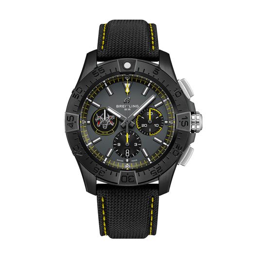 Introducing the BREITLING Avenger B01 Chronograph 44 Night Mission USN Bloodhounds by Breitling: a sleek black chronograph watch inspired by jet pilots, featuring a black case and strap accented in yellow. The watch showcases three subdials on its face, luminescent hands, and a distinctive yellow-tipped second hand, reminiscent of those used at the Naval Academy. Its bezel is adorned with minute indicators for precision timekeeping.