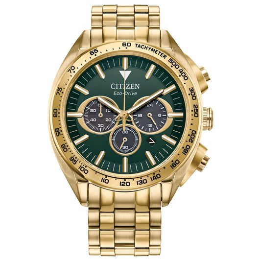 The CITIZEN Carson Eco-Drive 42mm Watch from the brand CITIZEN boasts a striking green dial. It includes three subdials, a tachymeter bezel, and gold-tone stainless-steel hour markers and hands, all beautifully complemented by a gold metal link bracelet.