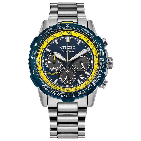 A CITIZEN Promaster Navihawk Eco-Drive 40mm watch with a blue and yellow-accented face, three subdials, and a silver link band is shown photographed on a white background.