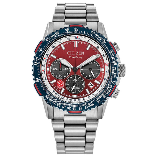 The CITIZEN Promaster Navihawk Eco-Drive 40mm Watch features stainless steel, a silver metal band, red and blue bezel, red dial with subdials and white markers—flight-inspired by the Royal Canadian Air Force.