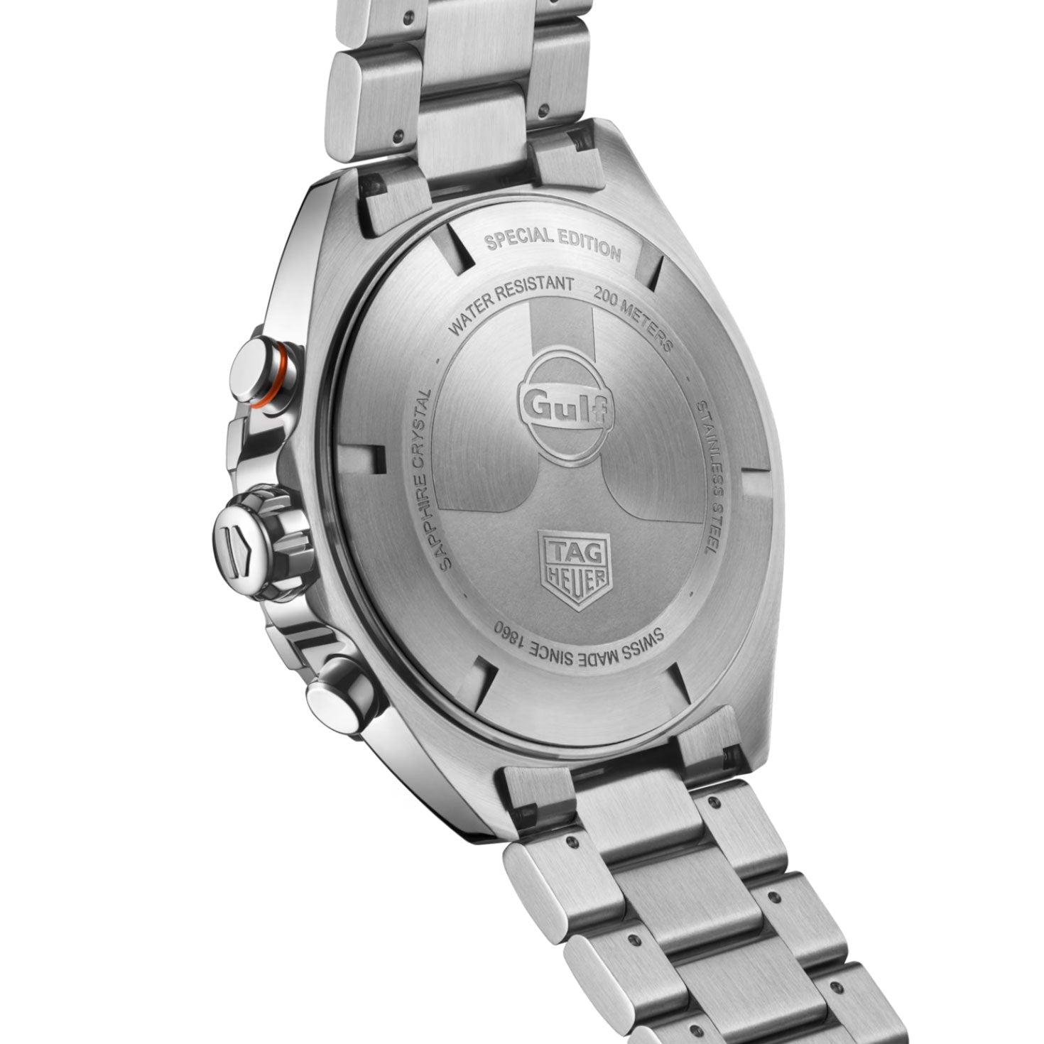 The image displays the case back of the TAG Heuer Formula 1 Chronograph x Gulf Special Edition Quartz 43mm Watch, prominently engraved with “Gulf,” “SPECIAL EDITION,” and “WATER RESISTANT 200 METERS.” These details underscore its status as a unique motorsport-inspired timepiece from TAG Heuer. The metal bracelet, along with the visible crown and pushers, further accentuates the sporty design of this special edition chronograph.