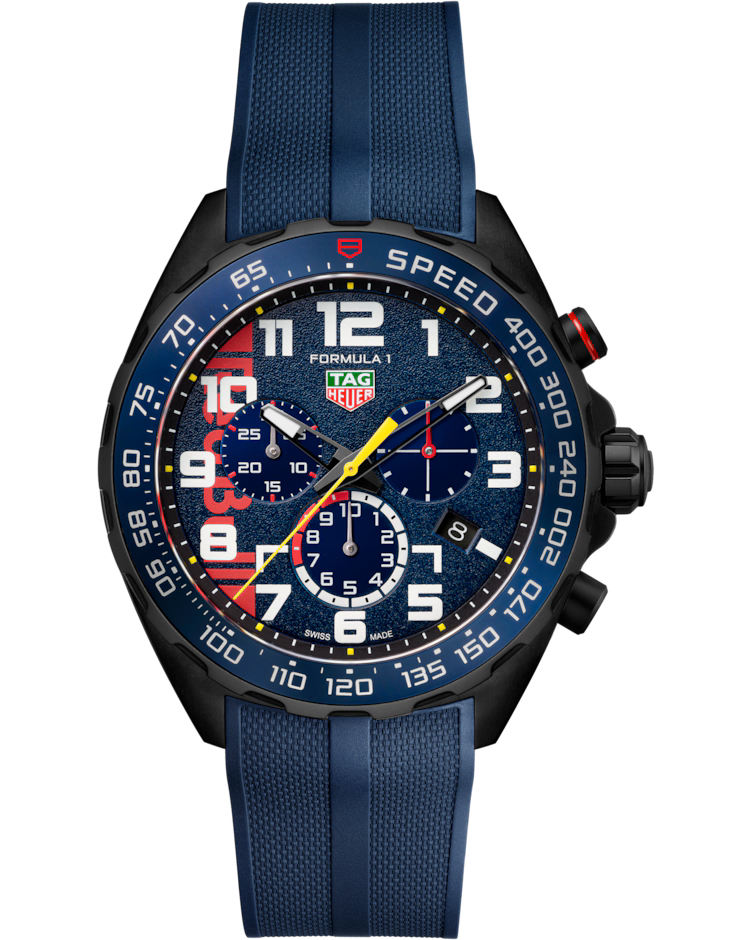 The TAG Heuer Formula 1 Chronograph x Oracle Red Bull Racing Special Edition Quartz 43mm Watch features a blue strap, blue textured dial with bold white numerals, striking red and yellow accents, three subdials including a central chronograph hand, and a tachymeter bezel.