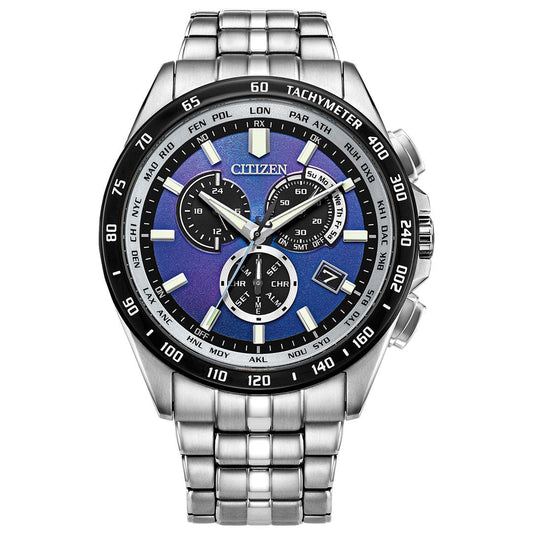 The CITIZEN Perpetual Chrono A-T Eco-Drive 43mm Watch features a stainless steel case, blue and black 100% recycled polycarbonate dial with multiple subdials, silver hour markers, date window, and a metal link bracelet.