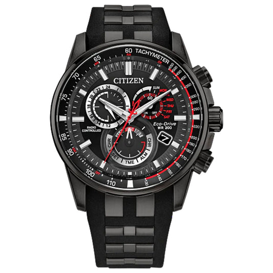 The CITIZEN Sport Luxury Eco-Drive 43mm men’s watch features a black round face, multiple dials, red and white accents, tachymeter markings, chronograph, date and day display, and a black rubber strap.
