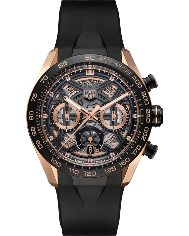 The TAG Heuer Carrera Chronograph Extreme Sport Automatic 44mm Watch features a luxurious black and rose gold skeleton dial with chronograph subdials, a tachymeter scale, and a black rubber strap.