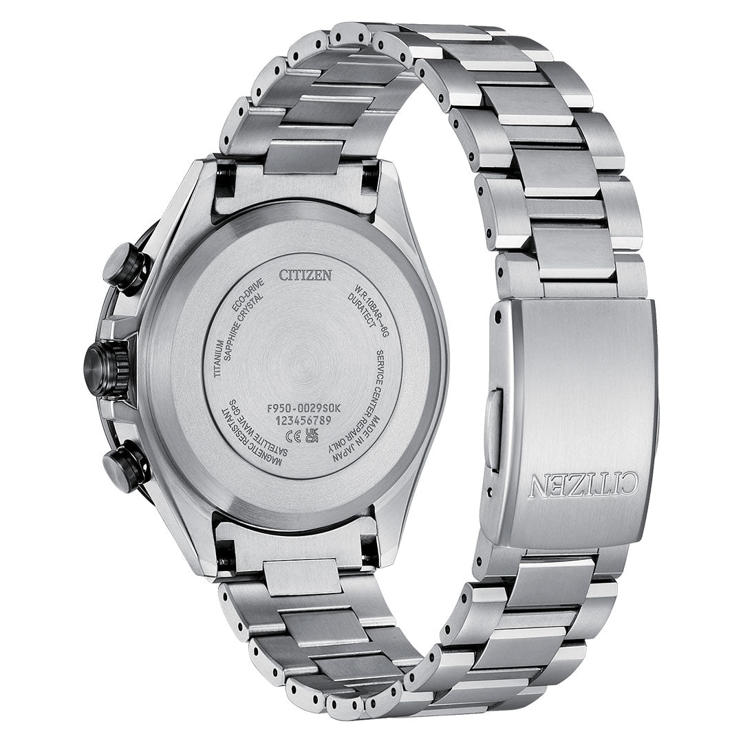 A close-up of the CITIZEN Attesa Satellite Time Keeping Super Titanium Limited Edition Eco-Drive 44.6mm shows engraved case back details, serial numbers, and "CITIZEN" on the clasp—a standout sustainable luxury timepiece.