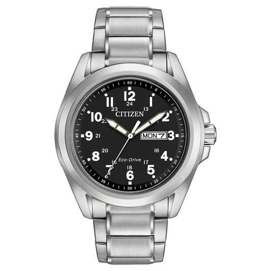 The CITIZEN Garrison Eco-Drive 43mm Watch is a sophisticated timepiece, featuring a silver metal band and a black round dial with white Arabic numerals and luminous hands. It includes a date display showing "Mon 7," a 24-hour clock within the inner circle, and is water-resistant for everyday adventures.