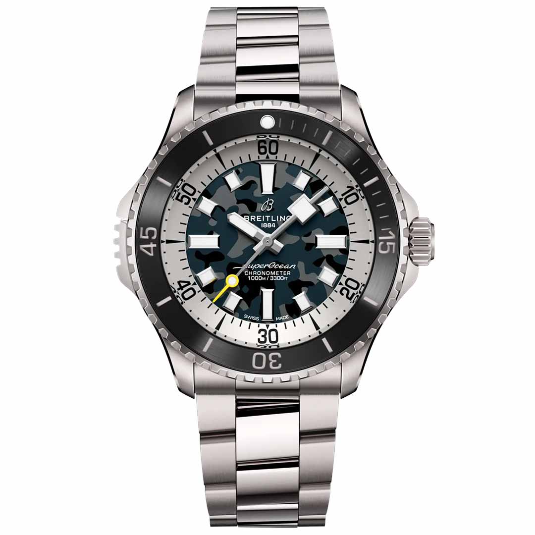 The BREITLING Superocean Automatic 46 Super Diver is a silver luxury dive watch featuring a metal band and luminescent indexes, with a detailed geometric design on the dial. Its rotating bezel displays white numerals that beautifully accentuate the Breitling logo visible on the watch face.