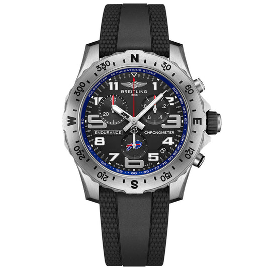 The BREITLING Endurance Pro 44 is a chronometer watch with a black dial, white hour markers, three subdials, black rubber strap, pulsometer bezel, and the Buffalo Bills logo above 6 o’clock.