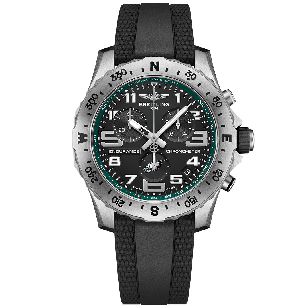 The BREITLING Endurance Pro 44 features a black dial, silver bezel, textured black rubber strap, luminescent hands, white numerals, and green accents—an ideal Philadelphia Eagles watch for dedicated fans.