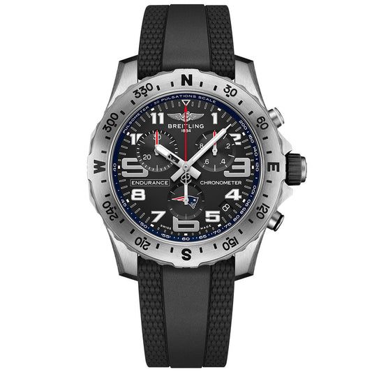 The BREITLING Endurance Pro 44 features a black dial with white numerals, three subdials, a pulsometer scale, black rubber strap, and a silver bezel with compass markings—ideal for New England Patriots fans.