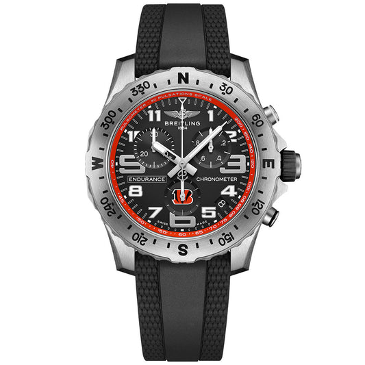 The Breitling Endurance Pro 44 NFL Edition chronograph features a black dial with red accents, bold numerals, and a black rubber strap. The Cincinnati Bengals logo is prominently shown at 6 o’clock.