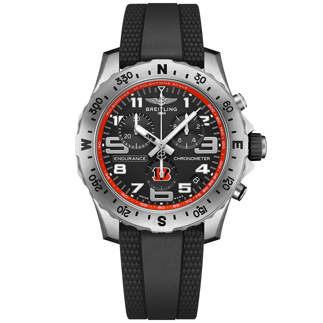 The Breitling Endurance Pro 44 NFL Edition chronograph features a black dial with red accents, bold numerals, and a black rubber strap. The Cincinnati Bengals logo is prominently shown at 6 o’clock.